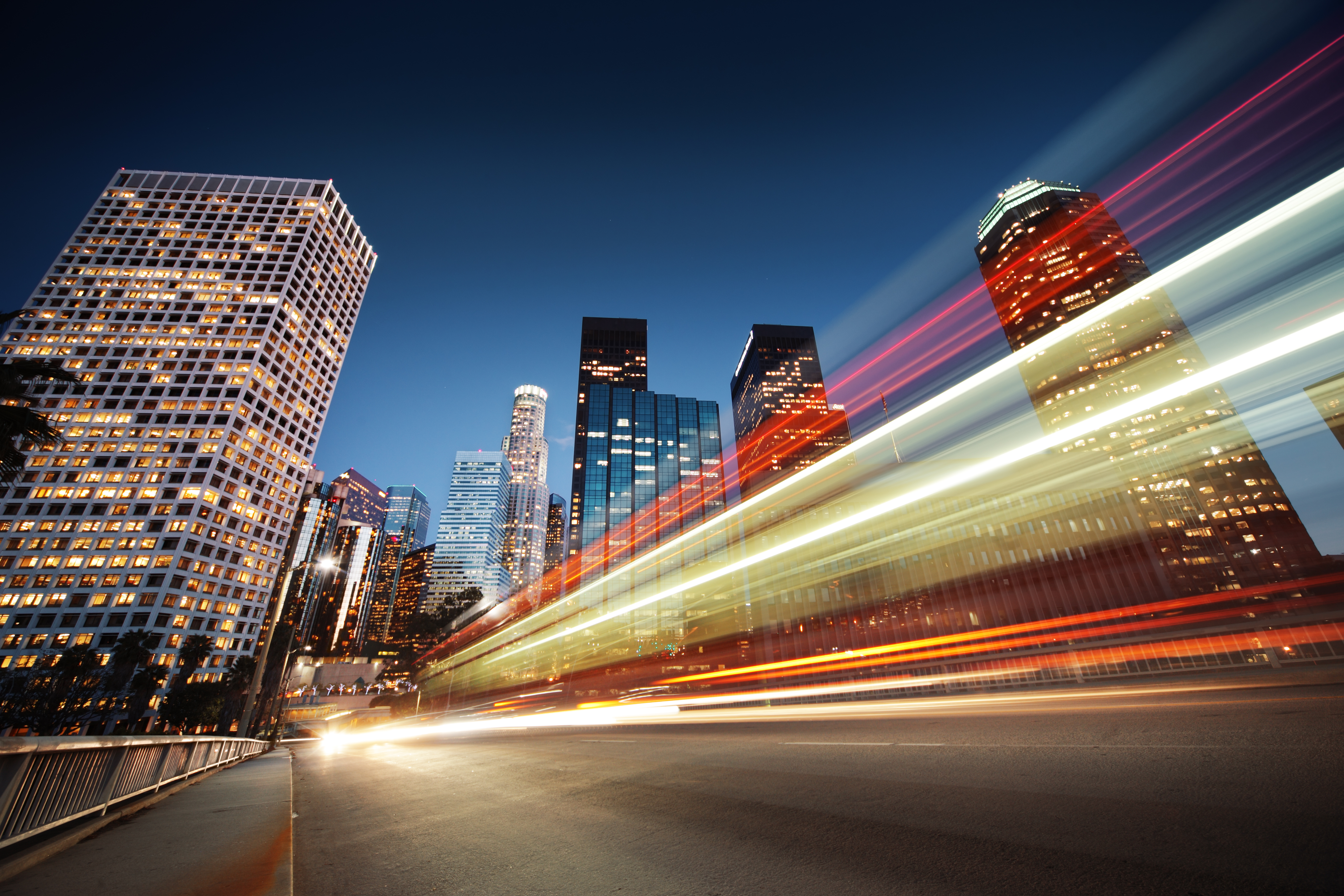 Light trails running through a city at night